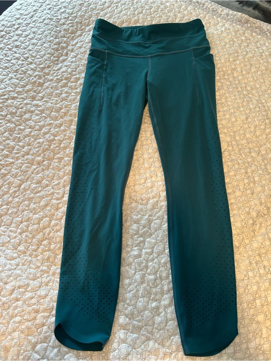 Athleta Pants - Athleta Chakra Teal 7/8 Powervita Tights with Laser Cut Design